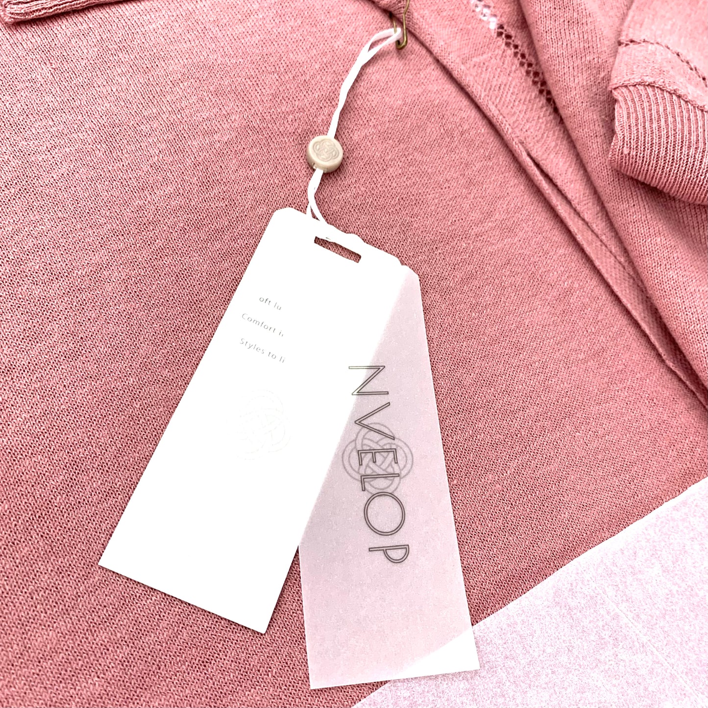 easy knit cardigan size S Dolman Sleeve tags close up with brand NVELOP on it